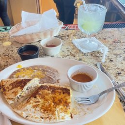 Jalisco Mexican Restaurant signature dishes Chicken Rice SoupChips and Cheese Dip  QuesoChicken Quesadilla